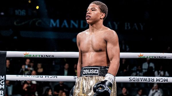 curmel moton standing in the ring against Hunter Turbyfill