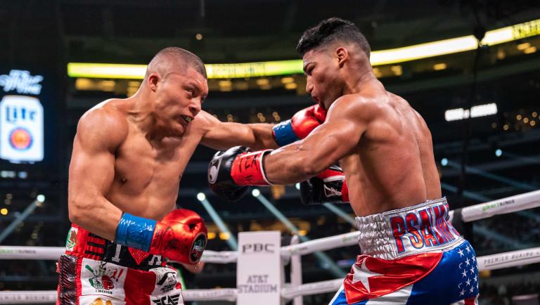 Isaac Cruz lands a left hook on Yuriorkis Gamboa